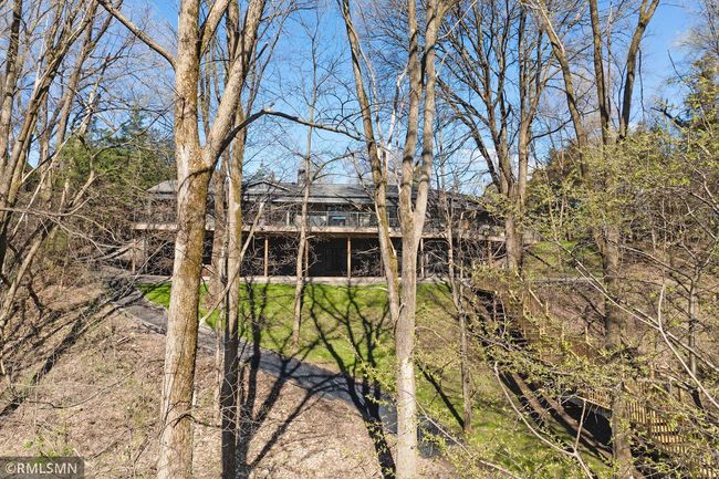 View of the back of the home from the lower lot | Image 69