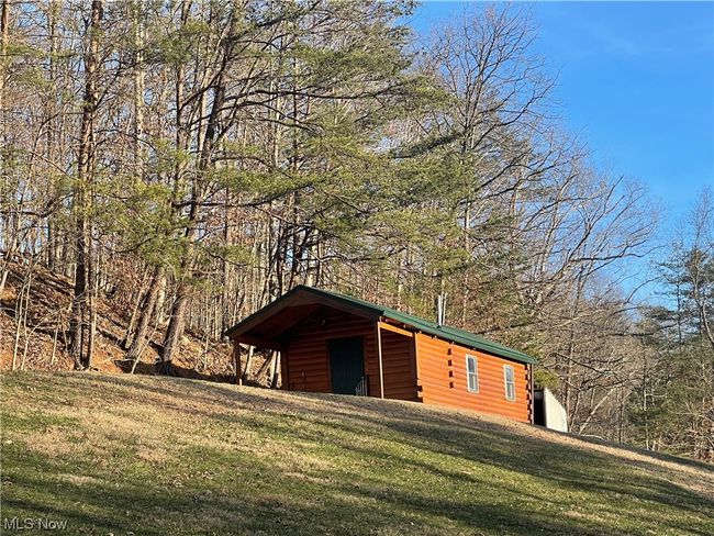 View of home's exterior featuring a lawn | Image 6