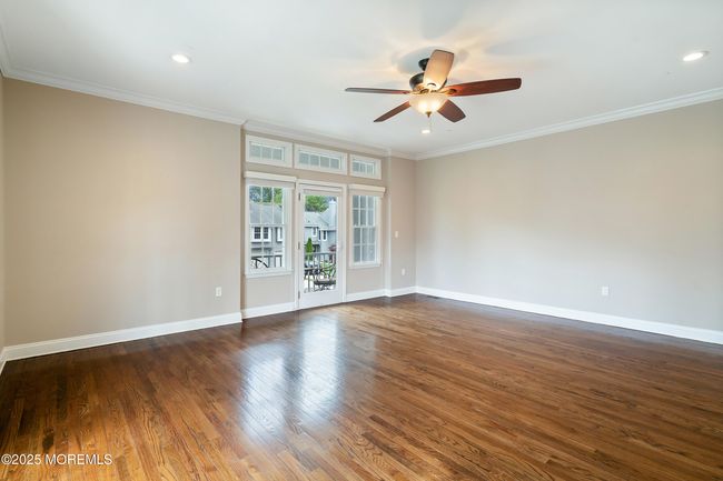 Family/Living room w/balcony | Image 31