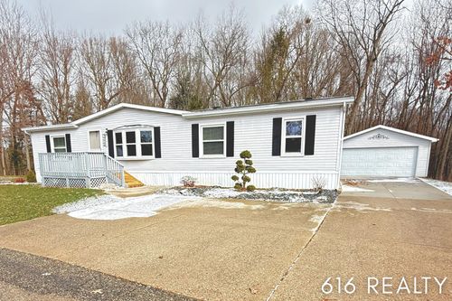 7358 Willow Wood Dr Ne, Belmont, MI, 49306-9419 | Card Image