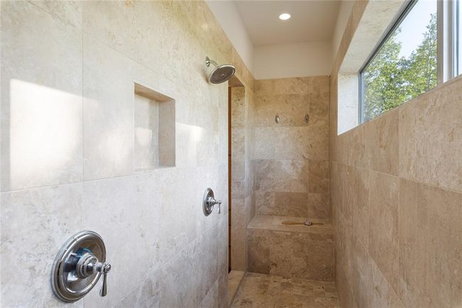 Bathroom with a tile shower | Image 23