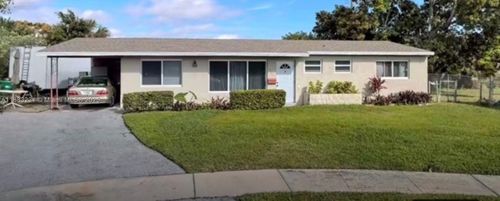 1556 N 24th Ct, Riviera Beach, FL, 33404-4004 | Card Image