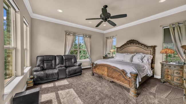 Bedroom featuring ornamental molding, carpet flooring, and recessed lighting | Image 21