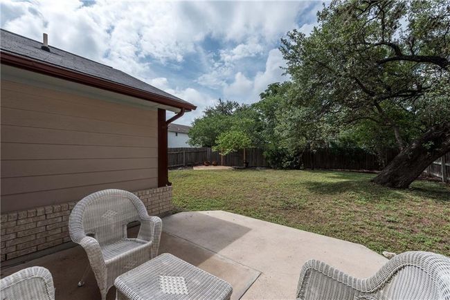 Fenced backyard featuring a patio area | Image 22