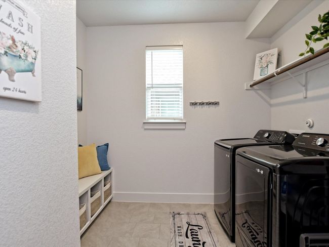 This Mud room is so large with extra storage! | Image 14