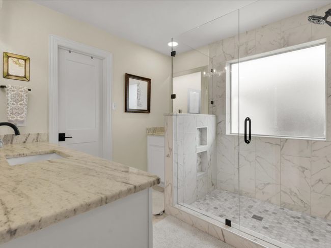 Bathroom with vanity, a marble finish shower, and recessed lighting | Image 23