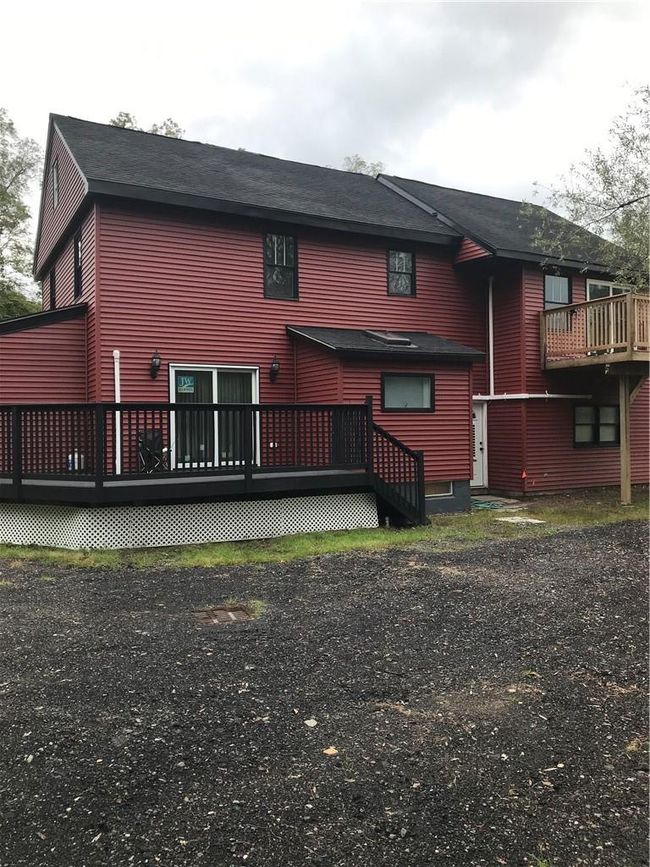 Rear view of property with a deck | Image 9