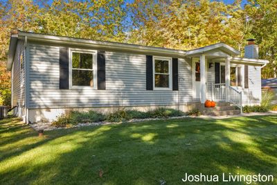 8673 Loveless Drive, House other with 3 bedrooms, 2 bathrooms and null parking in Howard City MI | Image 2