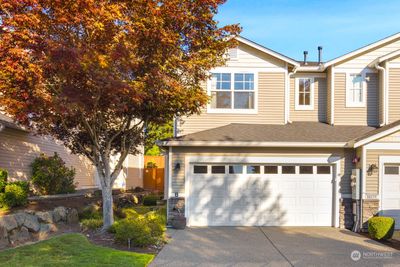 Welcome to your dream home! This stunning two-story residence features a spacious two-car garage and beautiful landscaping, making the perfect first impression. | Image 1