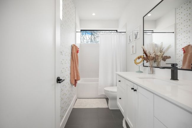 Full bath with tile patterned flooring, toilet, recessed lighting, vanity, and shower/bath combo | Image 25