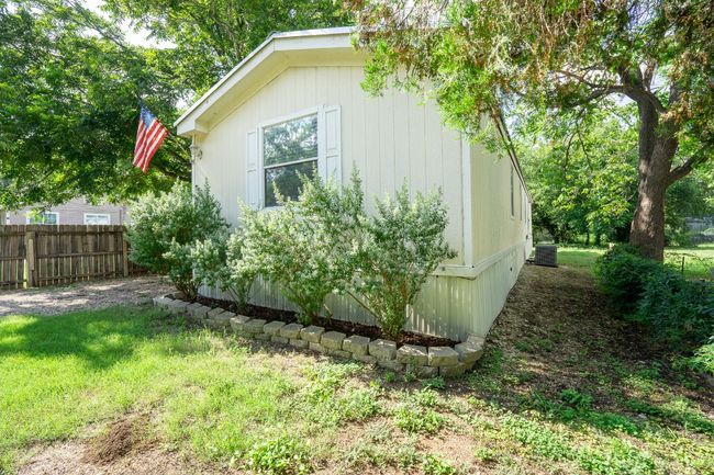 View of property exterior featuring a central air condition unit | Image 6