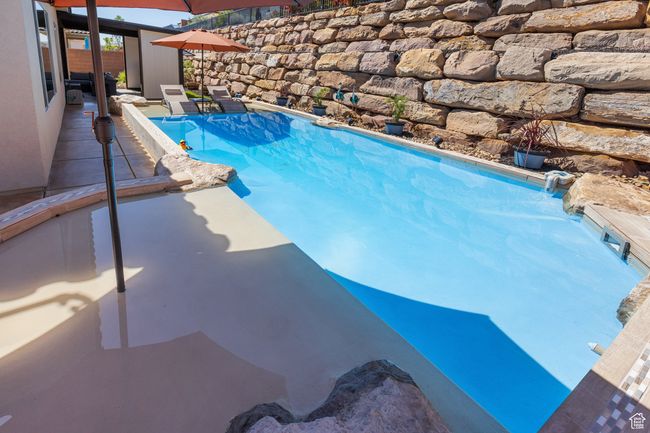 View of pool featuring a patio area | Image 5