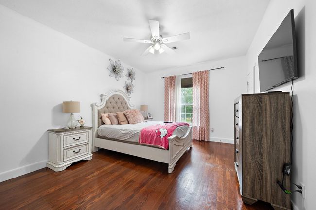 Comfortable bedroom with a serene atmosphere and natural light | Image 34