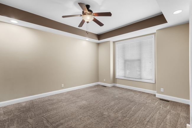 Large In-Law Suite Downstairs with Tray Ceiling, Ceiling Fan, Recessed Lighting, Full Private Bathroom & Walk-in Closet! | Image 13