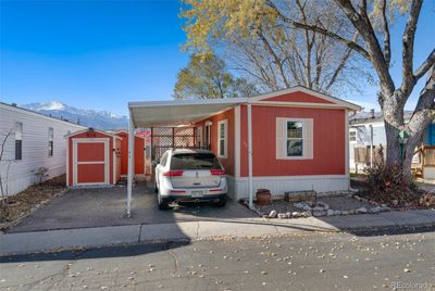 Front of mobile home facing west with Pikes Peak in background | Image 1