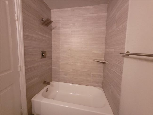 Nice tub and shower in secondary bathroom | Image 17