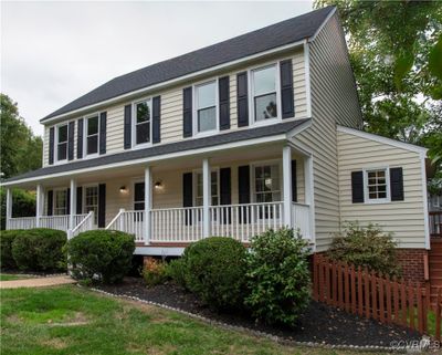 View of front facade featuring a porch | Image 2