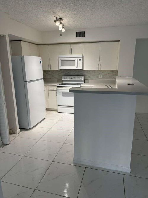 apt-103-4856 N State Road 7, Coconut Creek, FL, 33073-3340 | Card Image