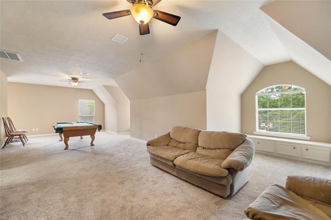 Create unforgettable moments in the expansive game room — ideal for billiards, gaming, or relaxing with friends. | Image 36