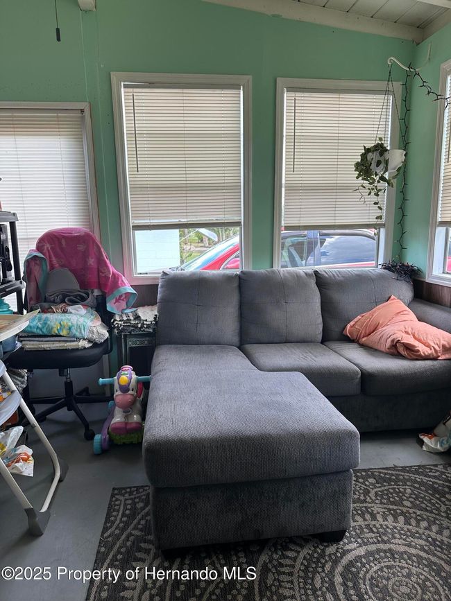 Florida Room has washer and dryer in it. | Image 11