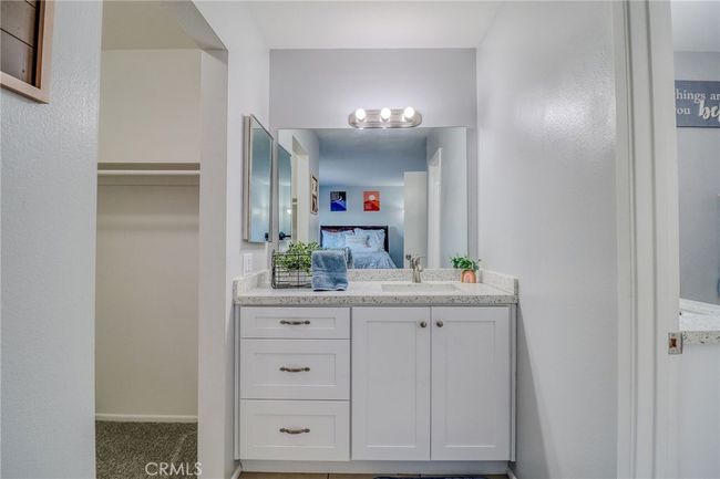 Primary Bedroom sink and vanity | Image 17