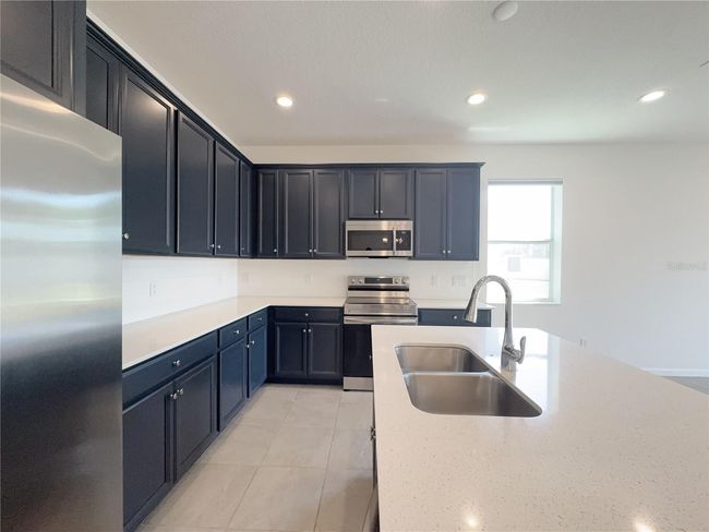 1009 Hendon Loop, House other with 4 bedrooms, 3 bathrooms and null parking in DAVENPORT FL | Image 33