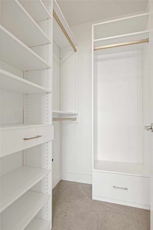 Spacious closet featuring carpet floors | Image 22