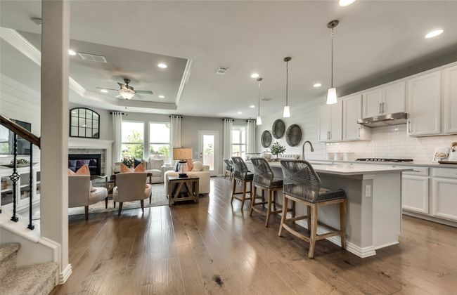 Bright kitchen with ample cabinet space *Photos of furnished model. Not actual home. Representative of floor plan. Some options and features may vary | Image 5