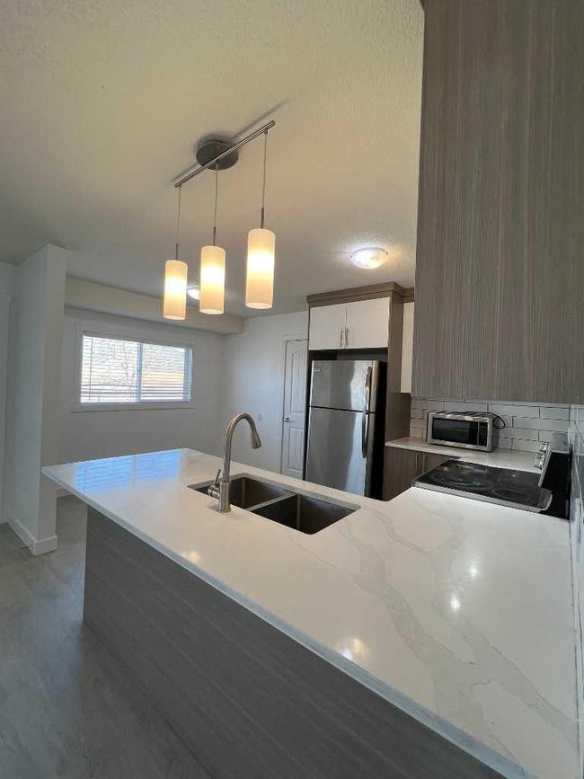 6132 Madigan Drive Ne, Home with 5 bedrooms, 2 bathrooms and 2 parking in Calgary AB | Image 7