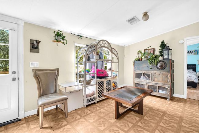 Front door/front living room | Image 9