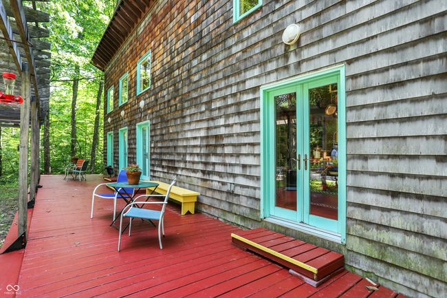 Wooden terrace with four sets of French doors | Image 11