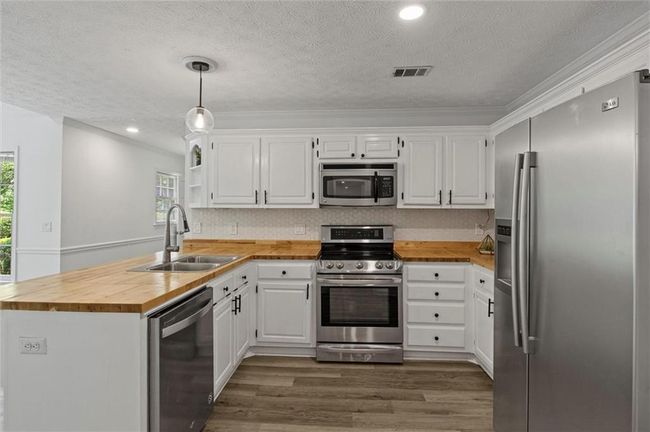 4220 Singing Post Ln Ne, House other with 5 bedrooms, 3 bathrooms and 2 parking in Roswell GA | Image 19