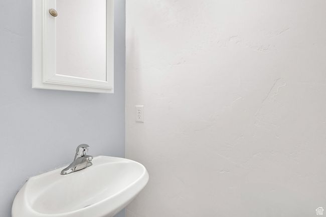Bathroom featuring a sink | Image 16