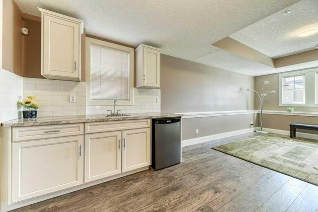 312 Boulder Creek Cres Se, House other with 3 bedrooms, 3 bathrooms and 6 parking in Langdon AB | Image 30