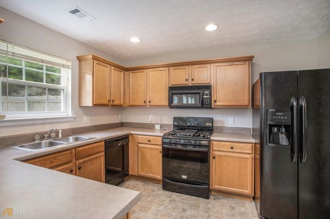 1276 Matt Moore Ct, House other with 3 bedrooms, 3 bathrooms and 2 parking in Lithia Springs GA | Image 4