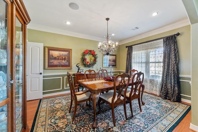 Stunning formal dining room with ample space for a large table w/china hitch and sideboard | Image 6