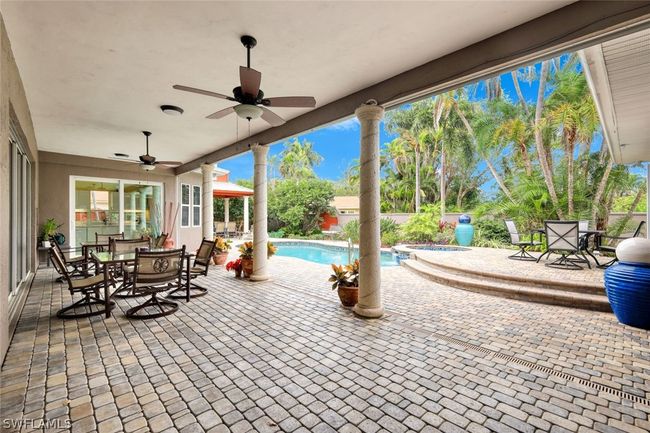 View of patio / terrace featuring ceiling fan | Image 12