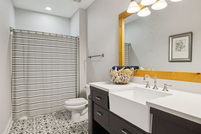 Stylish full bath with custom tile. | Image 39