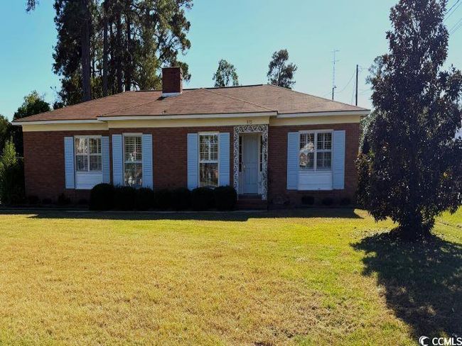 Single story home featuring a front lawn | Image 4