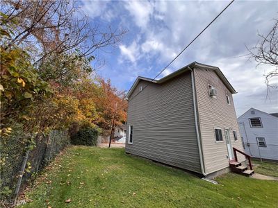 View of side of property with a yard | Image 2