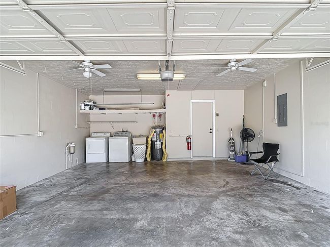 2 Car garage with laundry area and ceiling fans if you want to hang out. | Image 17