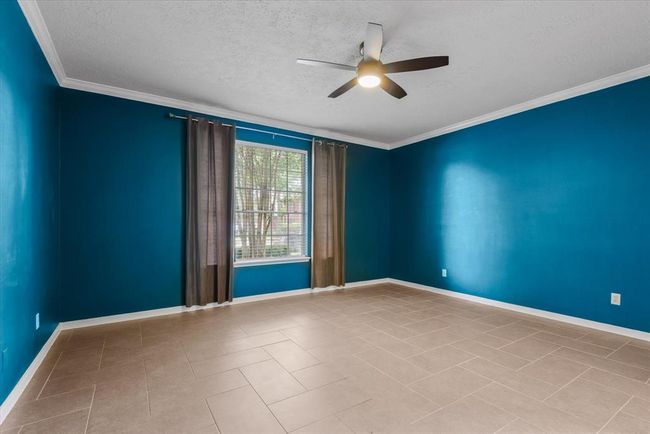Your primary retreat begins in this well-sized bedroom. Dream how you would apportion this space so that your soul rests well every time you walk in! | Image 13