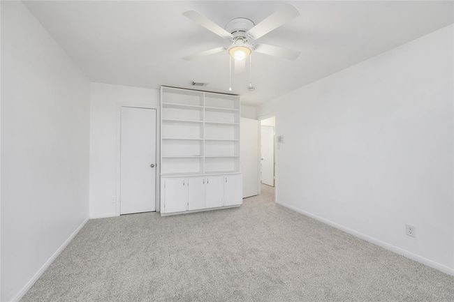 1st bedroom with shelves | Image 29