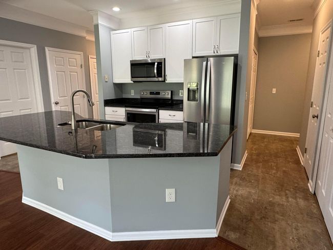 Video tour: youtube- 4947 Common Market Place, Dublin OH 43016. 2 BR 2 BA ranch condo, down hall toward laundry and gar entry | Image 13