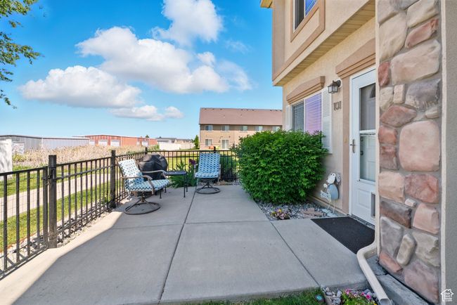 View of patio with a balcony | Image 5