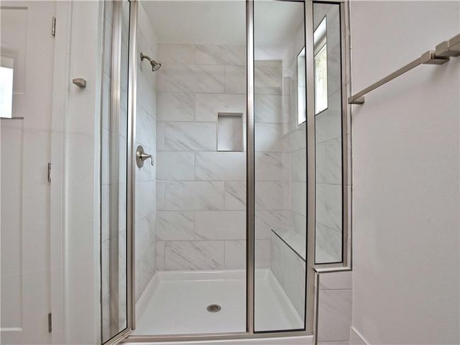 Bathroom with a shower stall | Image 14