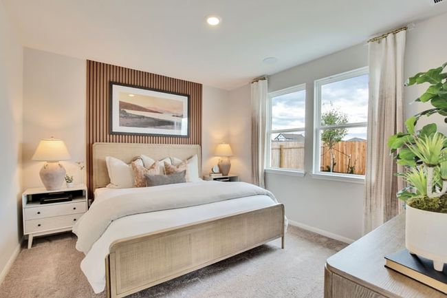 Bedroom featuring carpet flooring, baseboards, and recessed lighting | Image 5