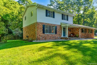 8076 Parkwood Drive, Home with 3 bedrooms, 1 bathrooms and null parking in Tyrone Twp MI | Image 3