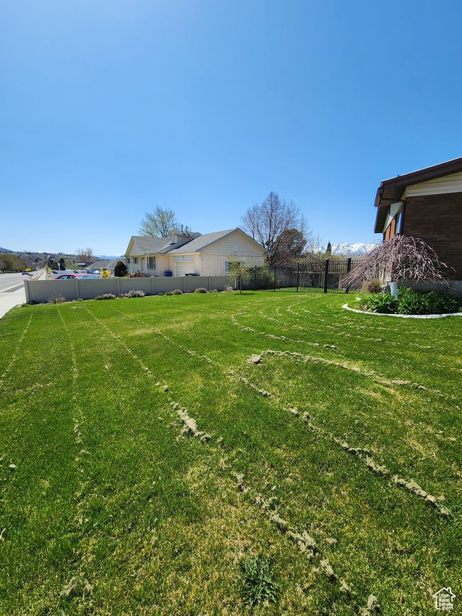 View of yard with fence | Image 56