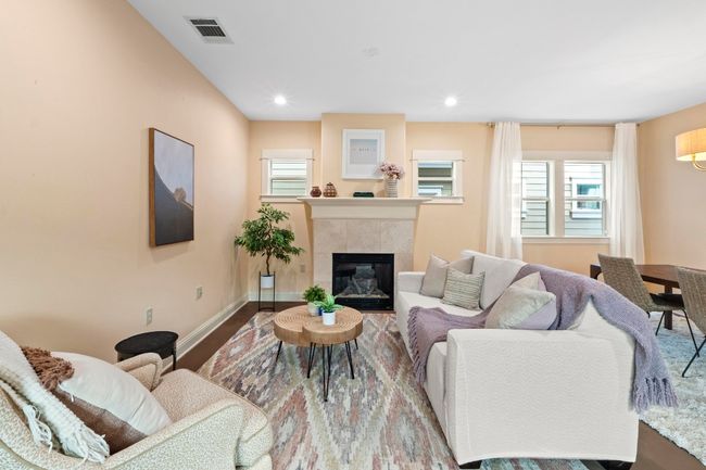 Cozy area with gas fireplace. | Image 13